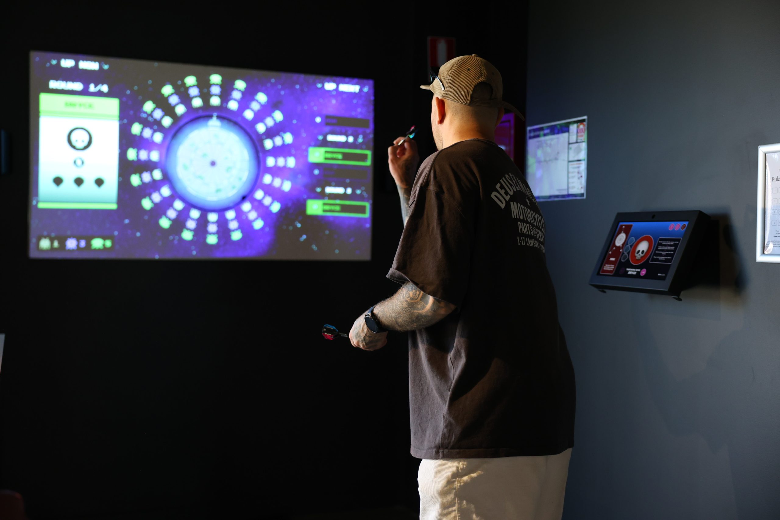 man playing ar darts at OuttaBounds in Perth