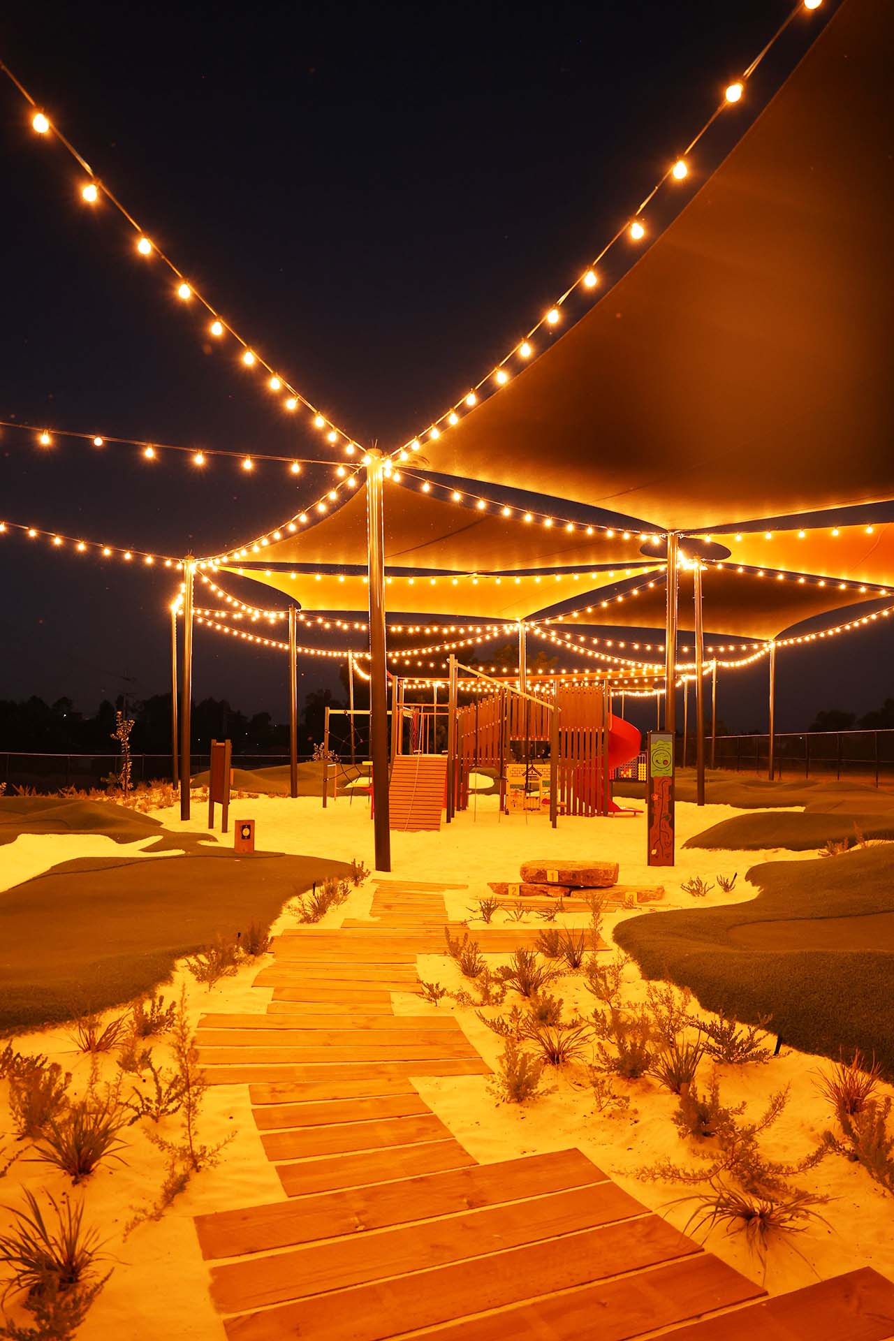 Mini Golf at OuttaBounds at Night Mini golf course at night with festoon lighting