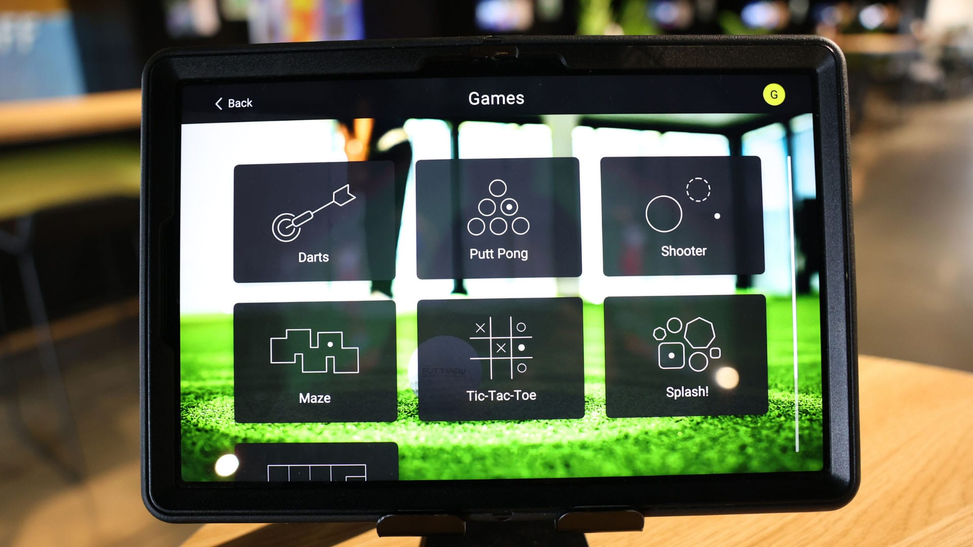 Variety of interactive putting games to select on touchpad console