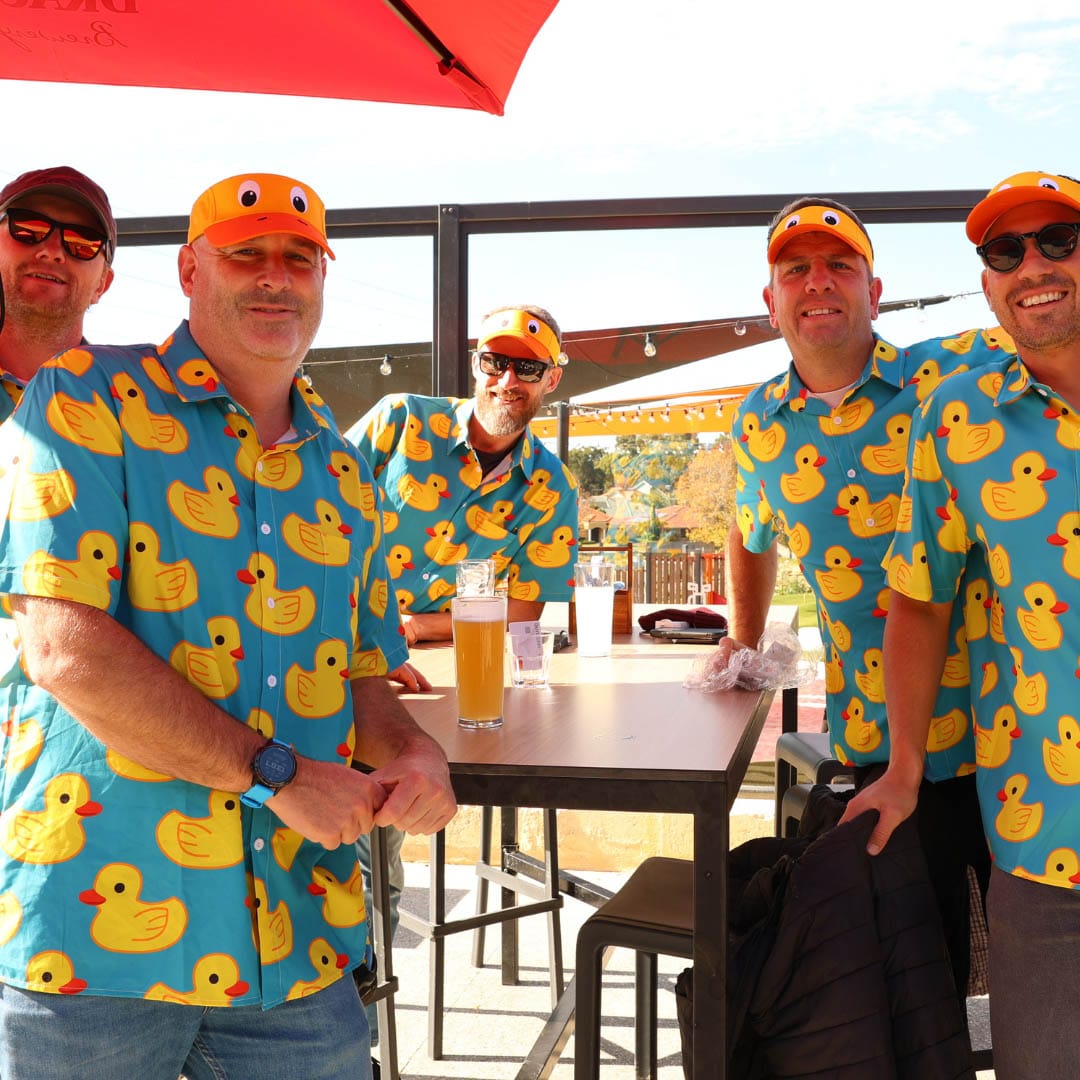 Men enjoying Bucks Party in outdoor area at OuttaBounds
