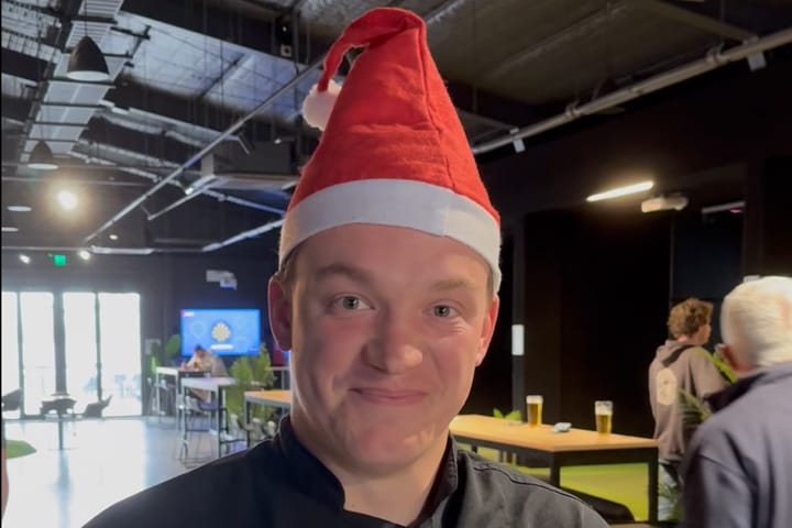 Chef at OuttaBounds wearing Christmas hat